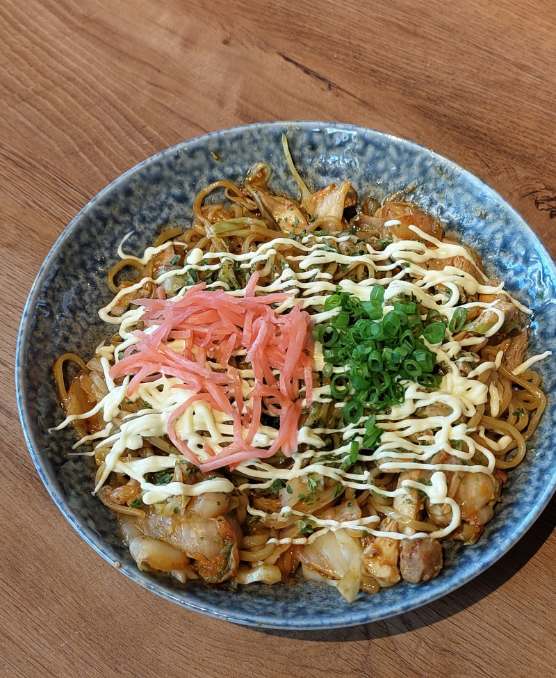 Yakisoba. Stir-fried noodles with chicken and a fruity sauce.